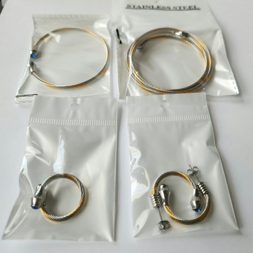 NWT Gift set, stainless steel wire rope, earrings, ring, bracelets.